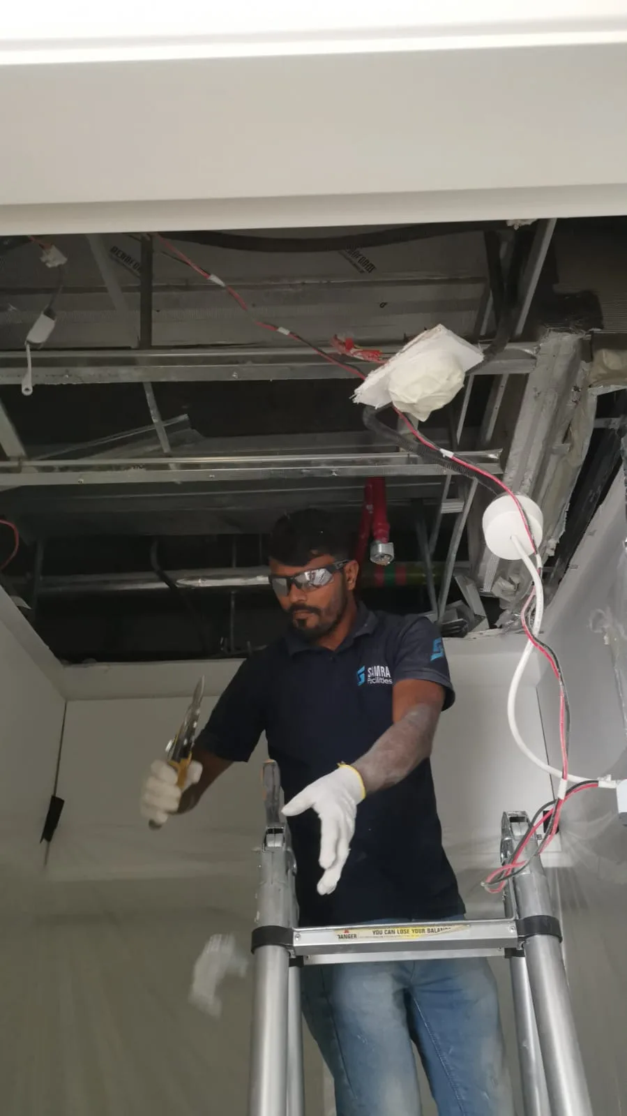AC indoor unit servicing — filter and coil access