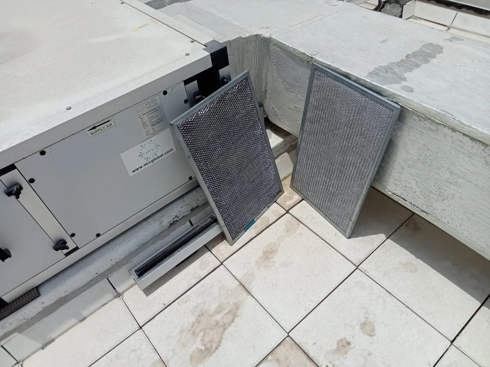 AC service in progress — refrigerant gauges and tools