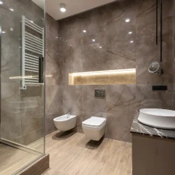 Wall tiling progress in a Dubai bathroom renovation