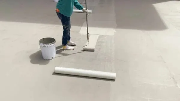 Waterproofing membrane application in progress