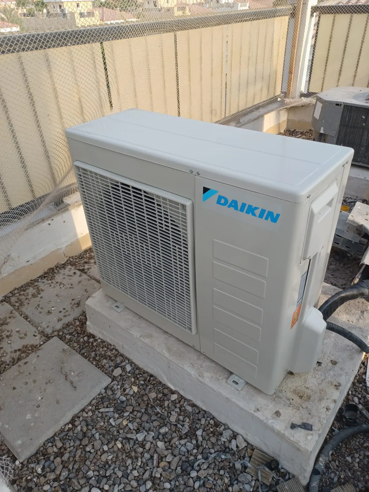 Outdoor AC unit installation on a Dubai villa by Samra Facilities