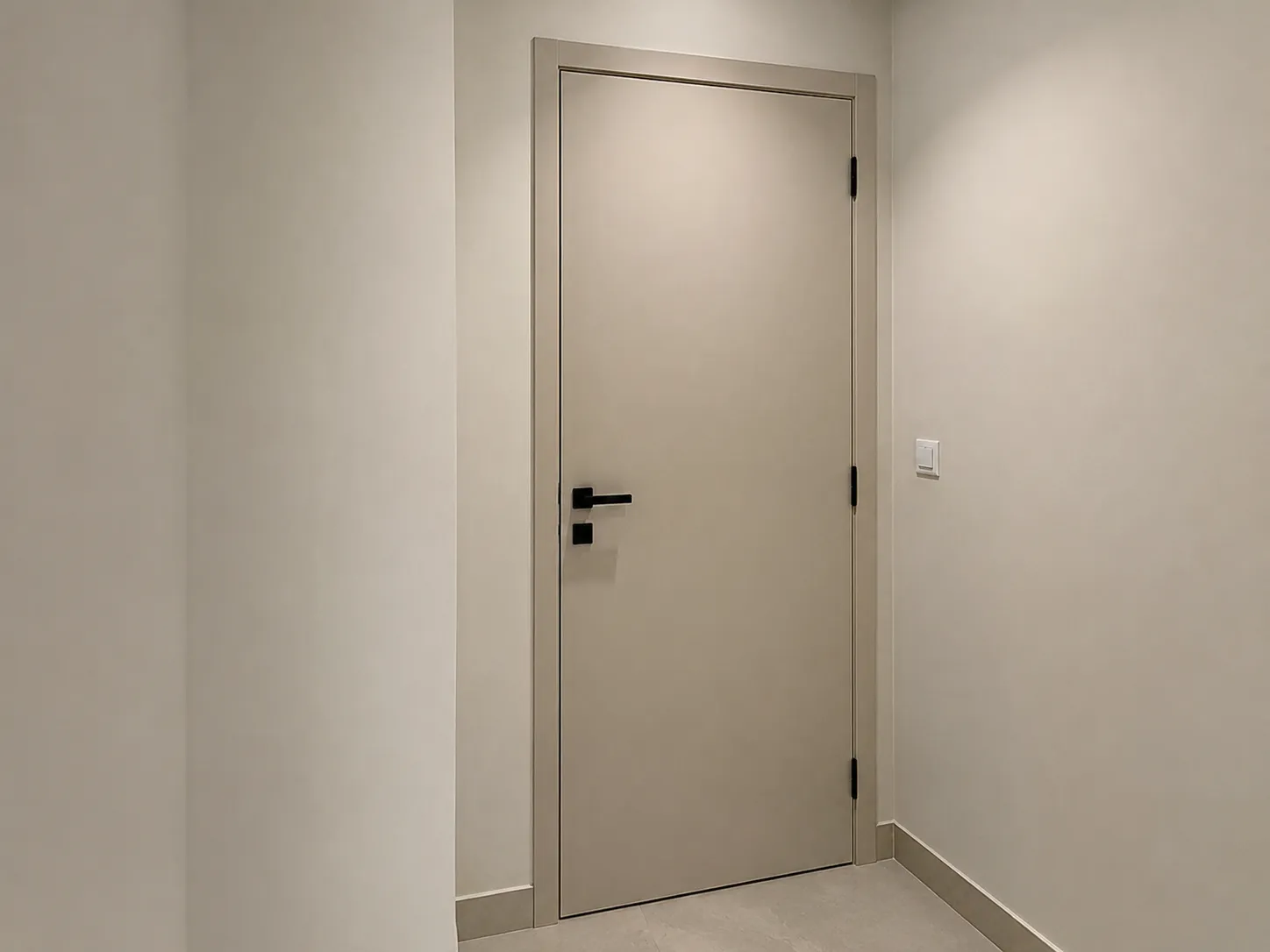 Internal door in a Dubai apartment repainted in a warm neutral with hardware removed and frame cut in cleanly
